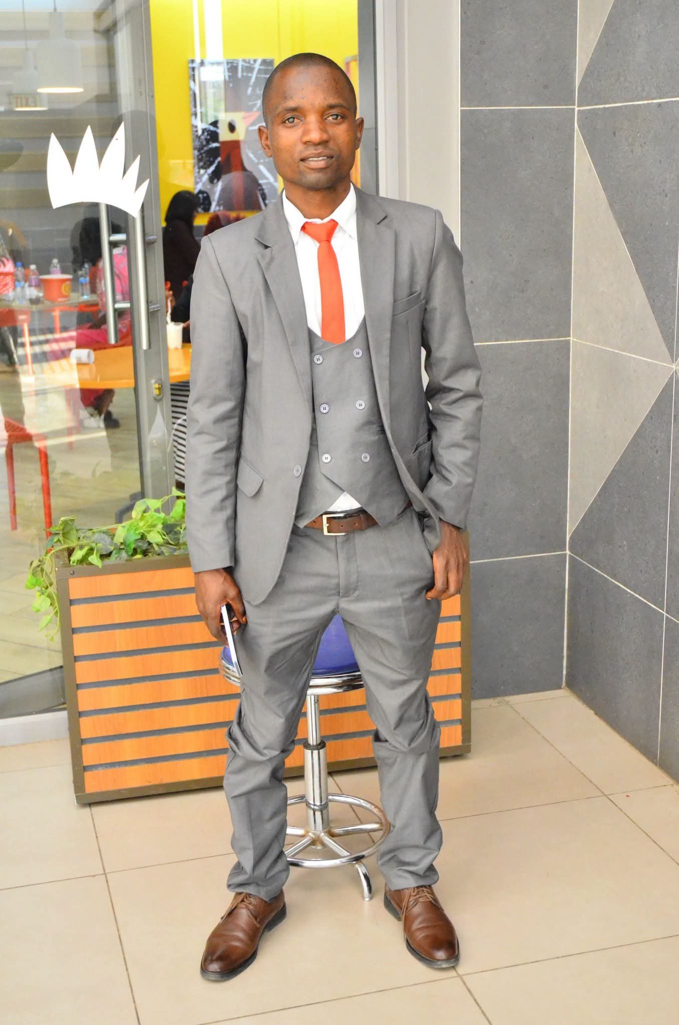 Portrait of ANDREW NGOBOLA