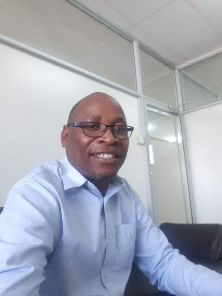 Portrait of Andrew Tayengwa