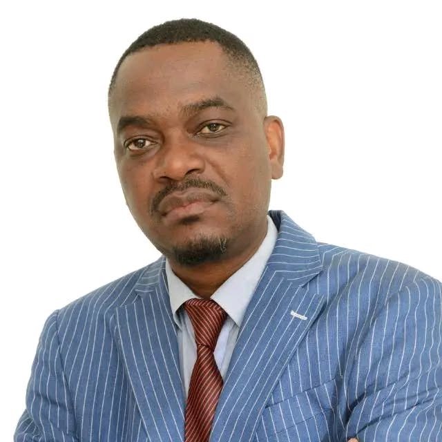 Portrait of Nick M Nkole